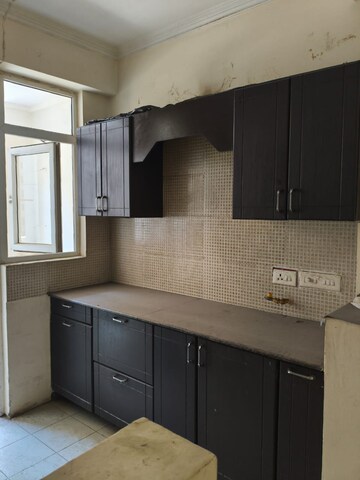 Kitchen in 2 BHK Apartment at Amrapali Silicon City, Sector 76 – for Rent