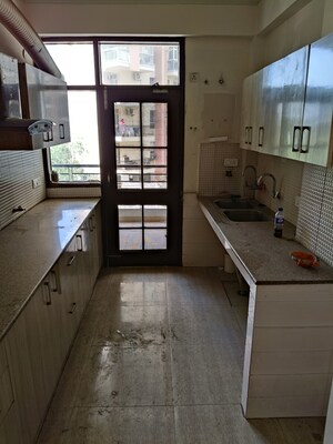 Kitchen in 4 BHK Apartment at New Generation Maple Apartments, Dhakoli – for Sale