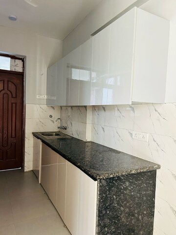Kitchen in 2 BHK Apartment at Supertech Cape Town, Sector 74 – for Rent