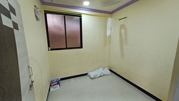 Bedroom in 1 BHK Apartment at Susan CHS, Naigaon West – for Sale