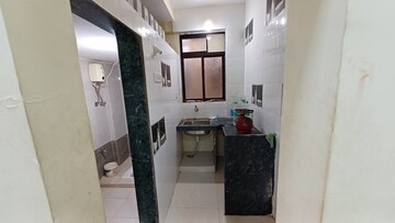 Kitchen in 1 BHK Apartment at Susan CHS, Naigaon West – for Sale