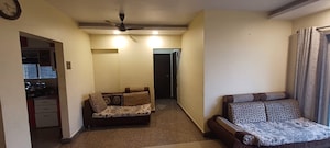 Living Room in 2 BHK Apartment at Siddhi Highland Park, Kolshet Road – for Sale