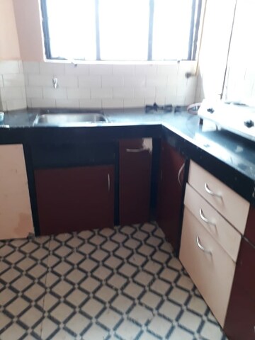 Kitchen in 1 RK Apartment at Janhavi CHS Kothrud, Kothrud – for Sale