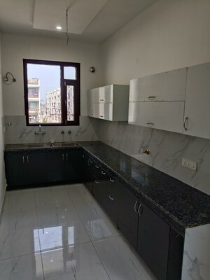 Kitchen in 3 BHK Builder Floor at Dhakoli Village – for Sale