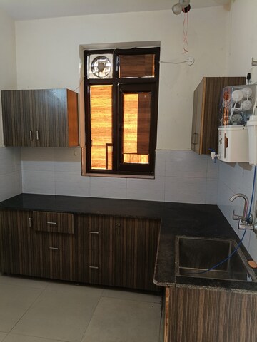 Kitchen in 1 BHK Builder Floor at Dhakoli Village – for Rent