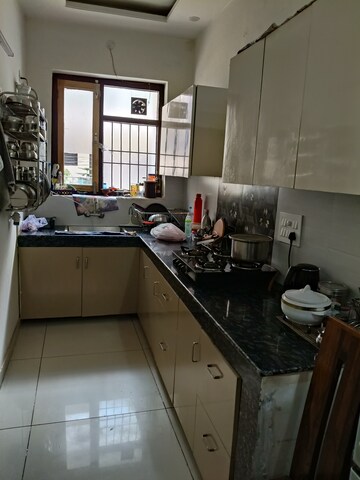 Kitchen in 3 BHK Builder Floor at Dhakoli Village – for Sale