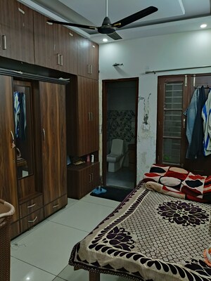 Bedroom in 3 BHK Builder Floor at Dhakoli Village – for Sale