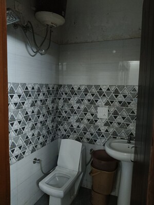 Bathroom in 3 BHK Builder Floor at Dhakoli Village – for Sale