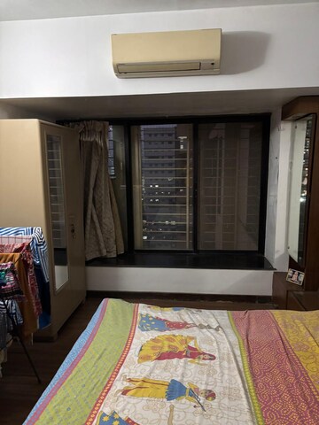 Bedroom in 2 BHK Apartment at Goyal Lakshchandi Heights, Goregaon East – for Rent