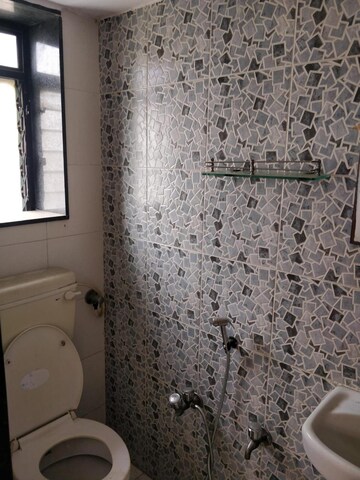 Bathroom in 2 BHK Apartment at Mittal Sushila Sadan, Mahim West – for Rent
