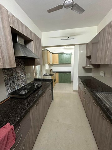 Kitchen in 3 BHK Apartment at Hiranandani Meadows, Manpada – for Rent