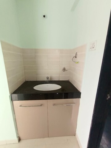 Kitchen in 2 BHK Apartment at Renuka Gulmohar C Building CHS, Pimpri – for Rent