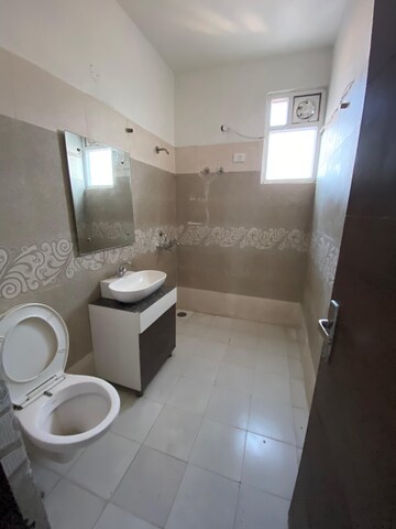 Bathroom in 3 BHK Apartment at Green Valley Heights, Dhakoli Village – for Sale
