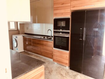 Kitchen in 4 BHK Apartment at DLF The Crest, Sector 54 – for Rent