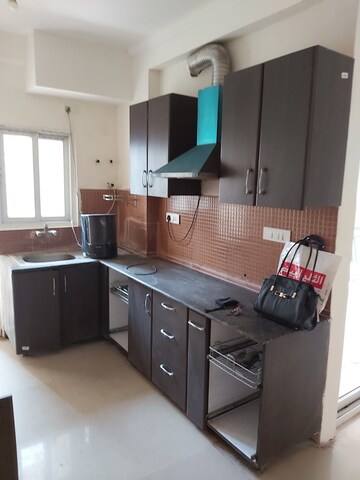 Kitchen in 3 BHK Apartment at Amrapali Platinum, Sector 119 – for Sale