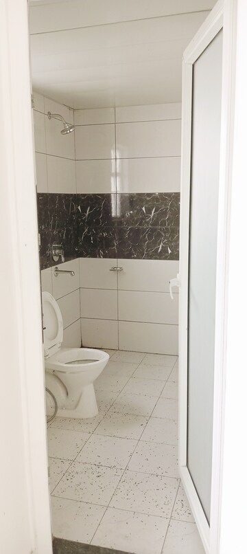 Bathroom in 3.5 BHK Apartment at Surat Residency, Vrindavan Colony – for Sale