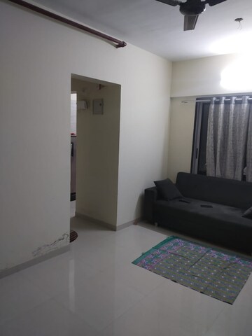 Living Room in 1 BHK Apartment at Cosmos Orchid, Ghodbunder Road – for Rent