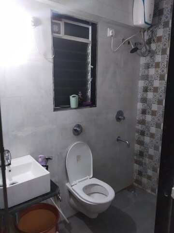 Bathroom in 1 BHK Apartment at Cosmos Orchid, Ghodbunder Road – for Rent