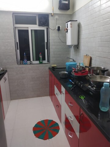 Kitchen in 1 BHK Apartment at Cosmos Orchid, Ghodbunder Road – for Rent