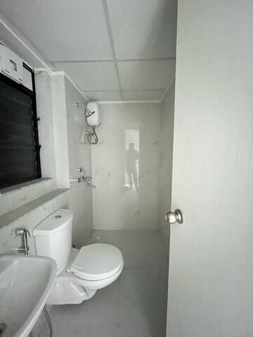 Bathroom in 2 BHK Apartment at Runwal Gardens Phase I, Dombivli East – for Rent