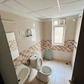 Bathroom in 3 BHK Apartment at Amrapali Centurian Park, Amrapali Dream Valley – for Rent
