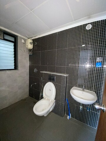 Bathroom in 2 BHK Apartment at Lodha Downtown, Dombivli East – for Rent