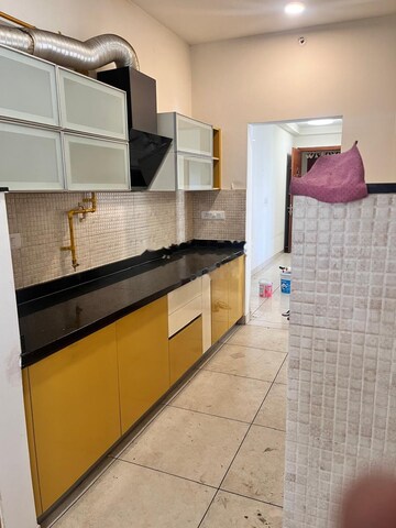 Kitchen in 2 BHK Apartment at Prestige Song Of The South, Yelenahalli – for Rent