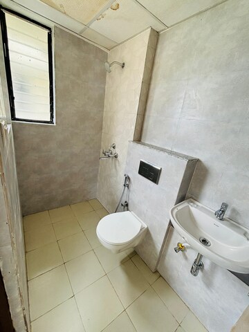 Bathroom in 1 RK Apartment at Wadhwa Wise City, Old Panvel – for Rent