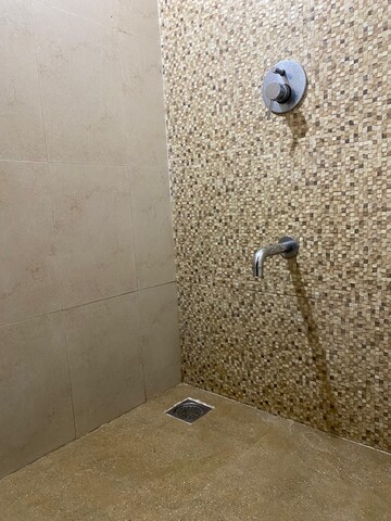 Bathroom in 1 BHK Apartment at Lodha Palava City Lakeshore Greens, Dombivli East – for Rent