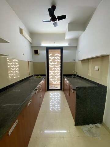 Kitchen in 2 BHK Apartment at Lodha Palava Downtown, Dombivli East – for Rent
