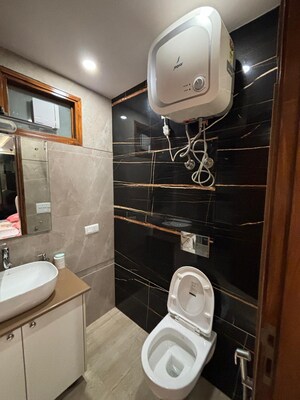 Bathroom in 3 BHK Builder Floor at Rajouri Garden – for Sale