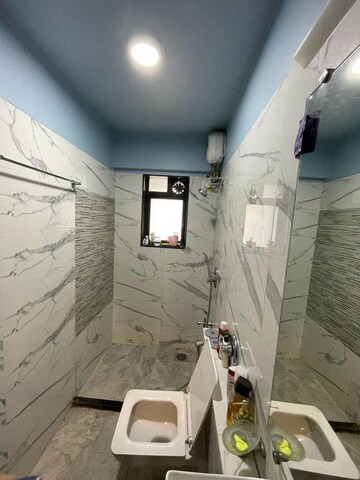 Bathroom in 3 BHK Apartment at Hubtown Hill Crest, Andheri East – for Rent