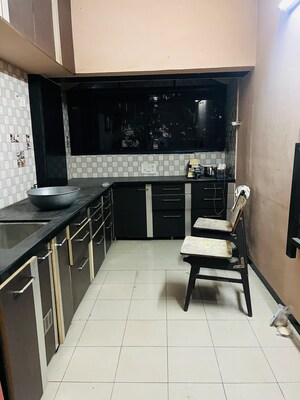 Kitchen in 2 BHK Apartment at Mansi Maniratna Complex, Walvekar Nagar – for Sale