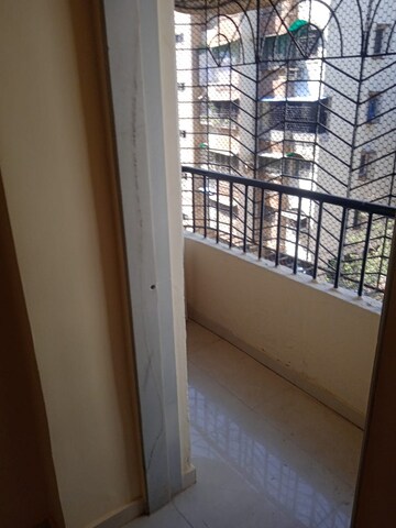 Balcony in 1 BHK Apartment at Lok Upvan I, Manpada – for Rent
