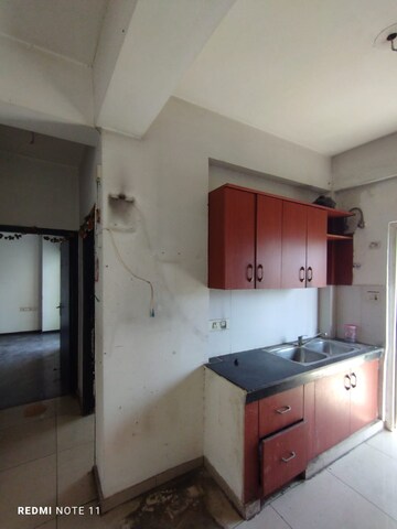 Kitchen in 2.5 BHK Apartment at Homes 121, Sector 121 – for Rent