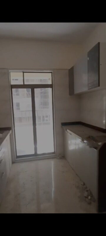 Kitchen in 2 BHK Apartment at Rustomjee Global City – for Sale