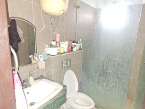Bathroom in 3 BHK Apartment at Puri Pranayam, Sector 82 – for Sale