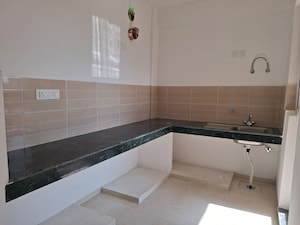 Kitchen in 4 BHK Independent House at BPTP Parkland Pride, Sector 77 – for Sale