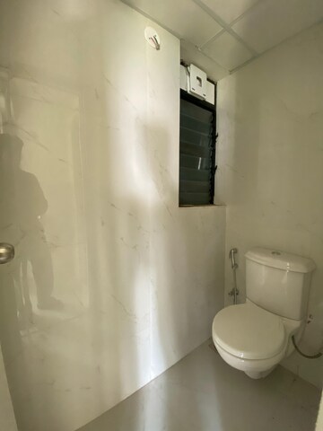 Bathroom in 1 BHK Apartment at Runwal Gardens, Dombivli East – for Rent