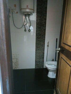 Bathroom in 4 BHK Builder Floor at Nehru Enclave – for Sale