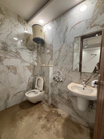 Bathroom in 2 BHK Builder Floor at Freedom Fighters Enclave – for Rent