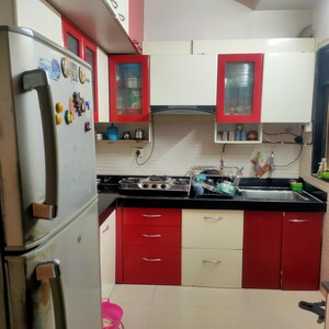Kitchen in 2 BHK Apartment at Cosmos Jewels Ruby, Parkwoods – for Sale