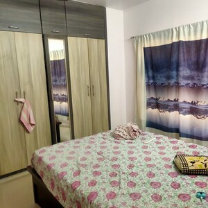 Bedroom in 2 BHK Apartment at Cosmos Jewels Ruby, Parkwoods – for Sale