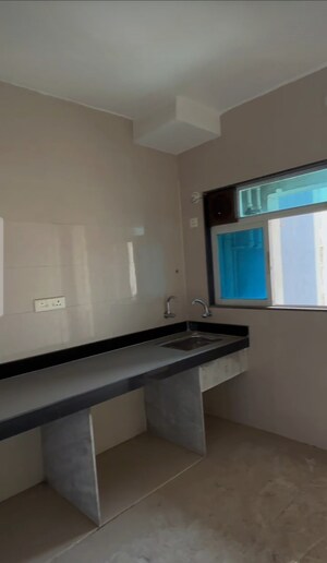 Kitchen in 2 BHK Apartment at Cosmos 27 Gbr, Kasarvadavali – for Sale