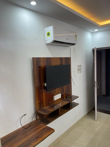 Living Room in 1 RK Apartment at Emaar Emerald Floors Premier, Sector 65 – for Rent