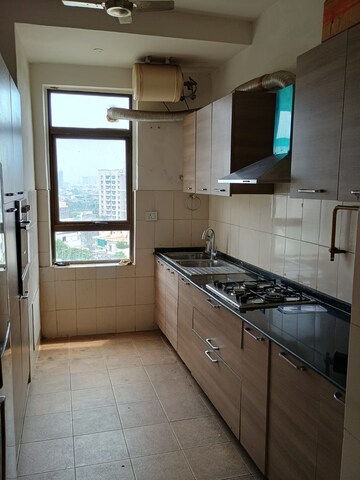 Kitchen in 3 BHK Apartment at Unitech Fresco, Sector 50 – for Rent