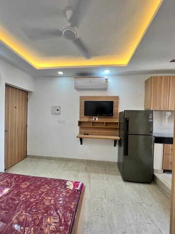 Living Room in 1 RK Apartment at Emaar Emerald Floors Premier, Sector 65 – for Rent
