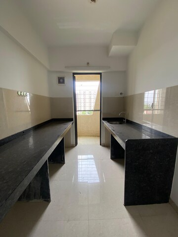 Kitchen in 1 BHK Apartment at Lodha Palava Downtown, Dombivli East – for Sale