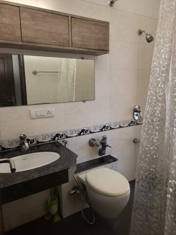 Bathroom in 1 BHK Apartment at Kiran Towers, Malad West – for Rent