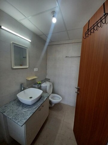 Bathroom in 3 BHK Apartment at Bhartiya Nikoo Homes Phase 2, Thanisandra Main Road – for Rent
